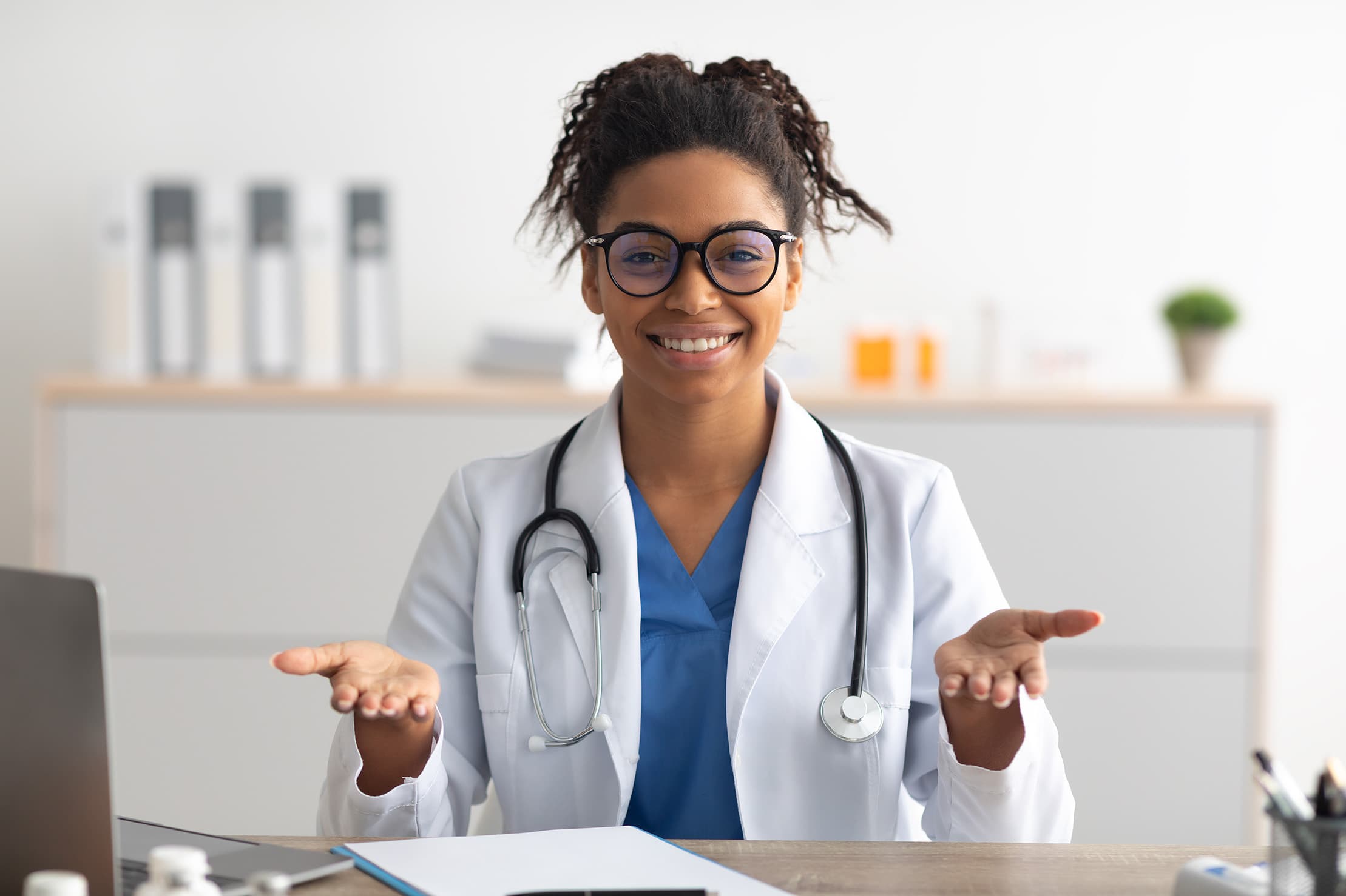 portrait of black female medical practitioner talking